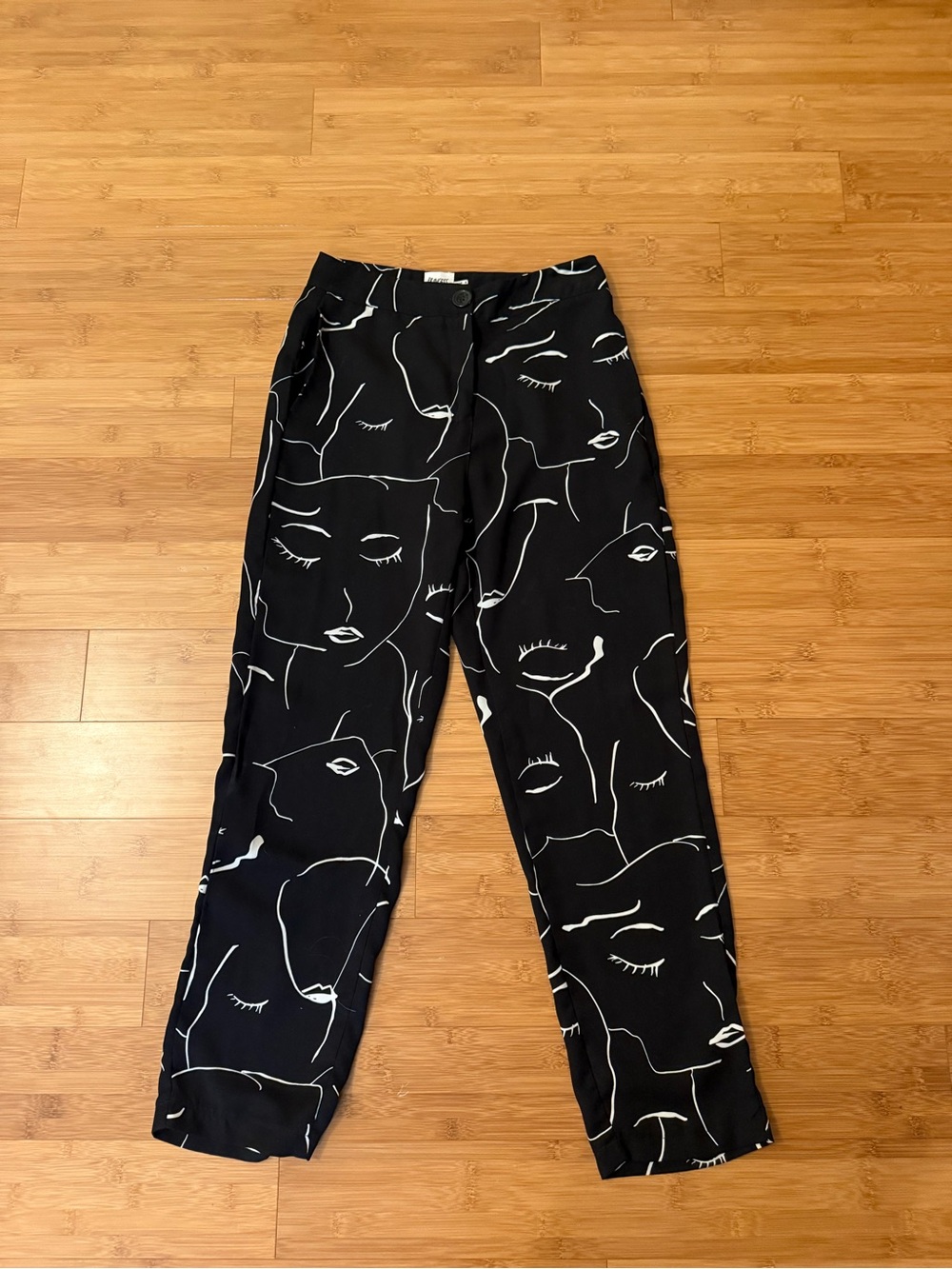 Princess Polly Black Cropped Face Print Pants